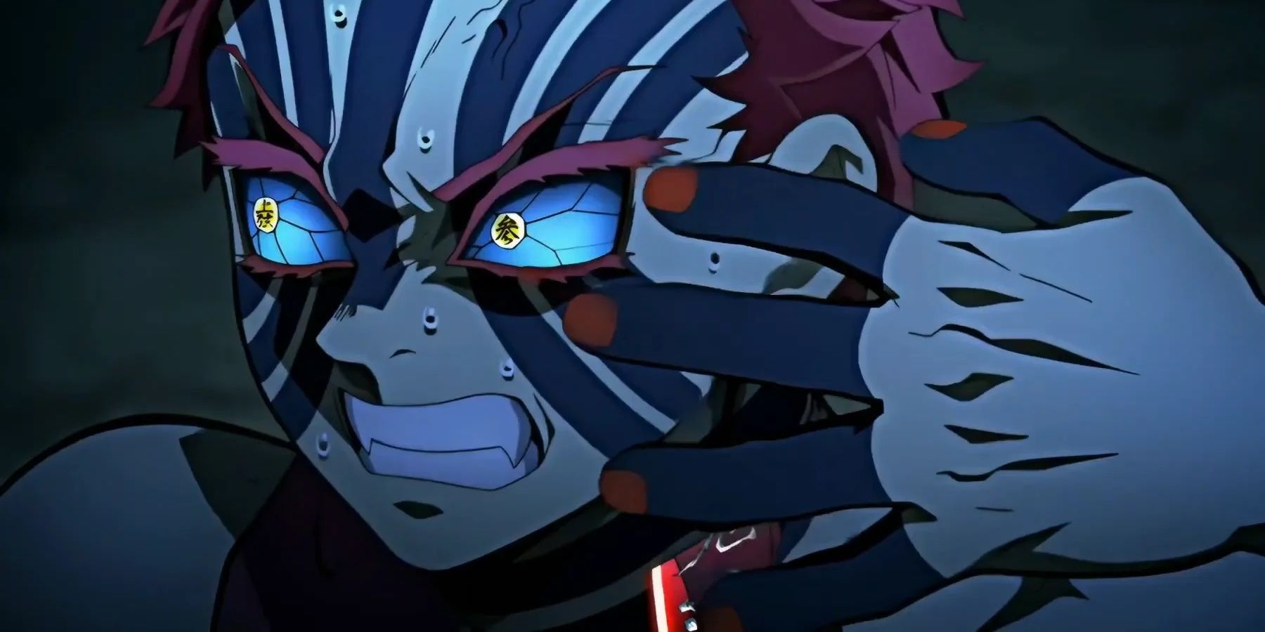 Akaza montre les dents en combattant Kyojuro dans Demon Slayer.