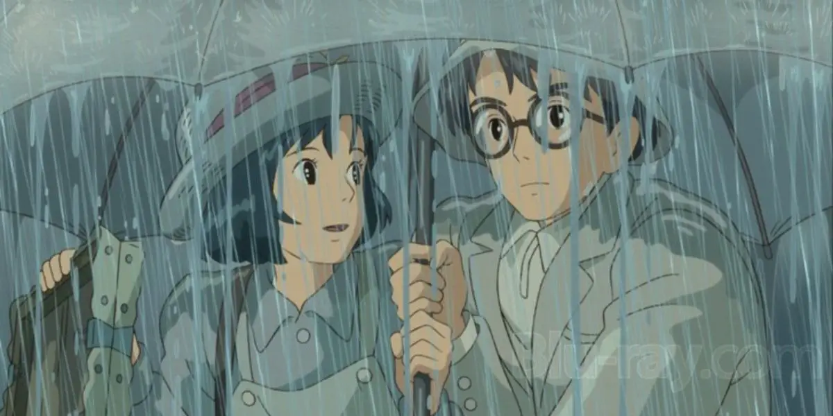 Jiro et Nahoko partagent un parapluie sous la pluie dans Le vent se lève.